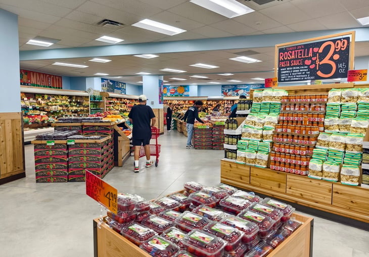 Customers shop for groceries at Trader Joe's in Miami, FL, 2024