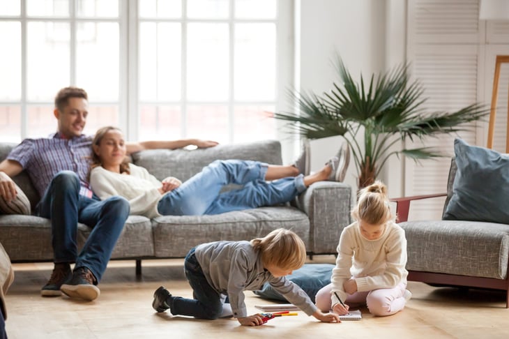 Family playing together in the living room