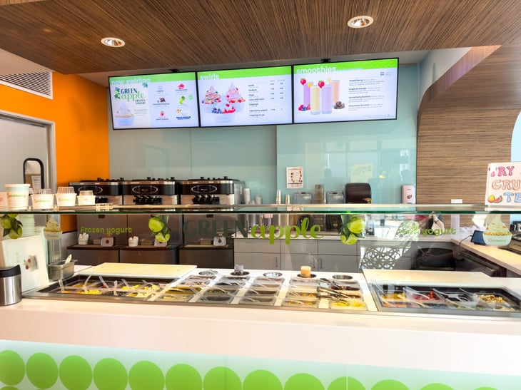 Interior of a frozen yogurt shop known as Pinkberry.