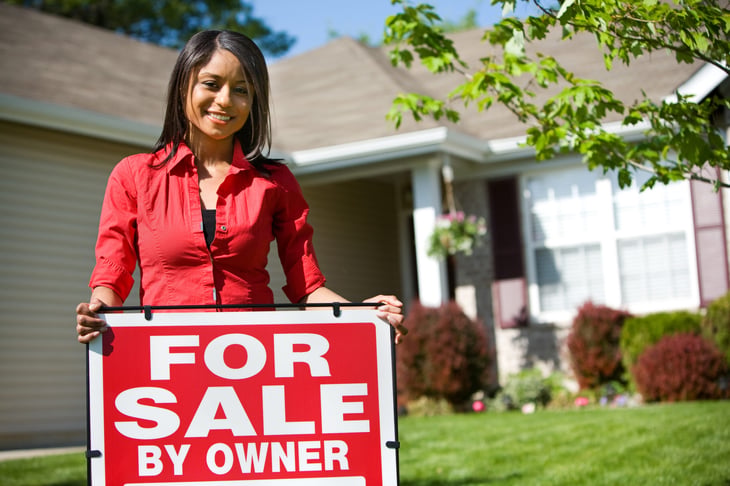 Woman selling her "for sale by owner" home