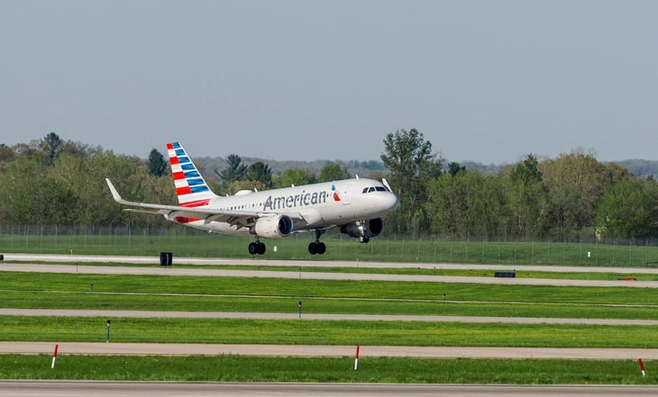 American Airlines airplane taking off from Gerald R. Ford International Airport