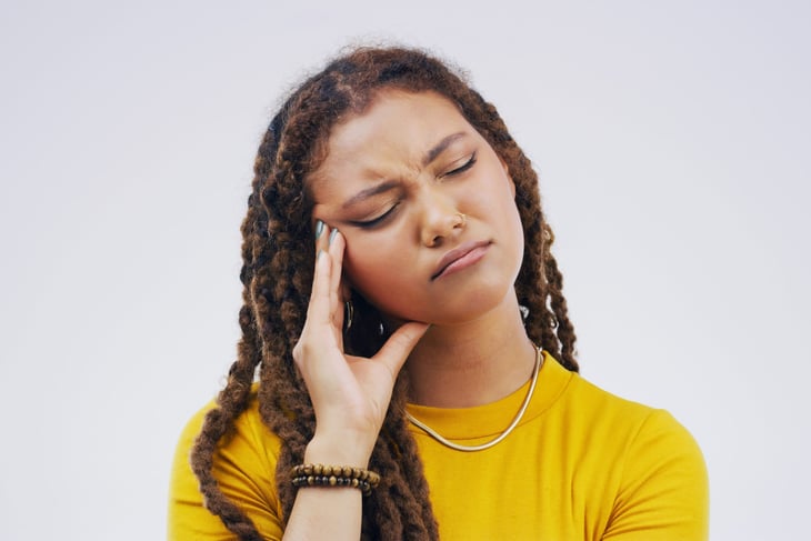 Young woman is stressed out.