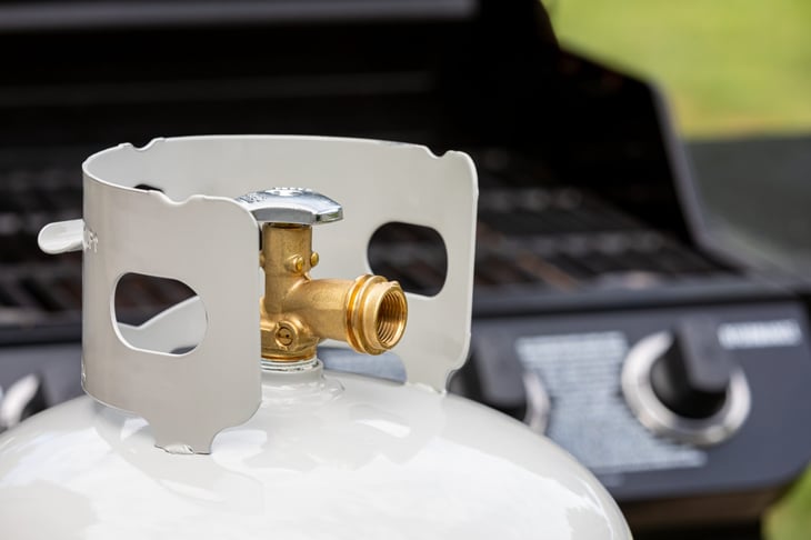 Propane gas cylinder for BBQ grill.