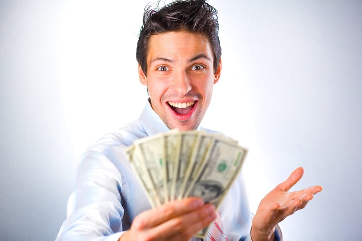 Worker holding money