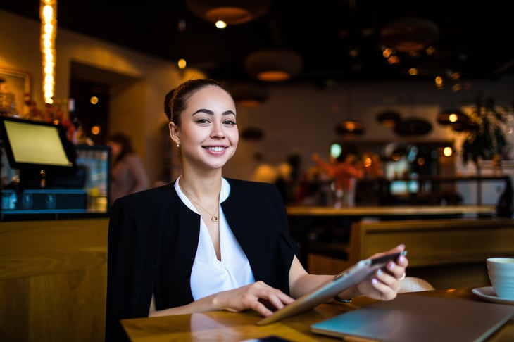 Business woman holding tablet.