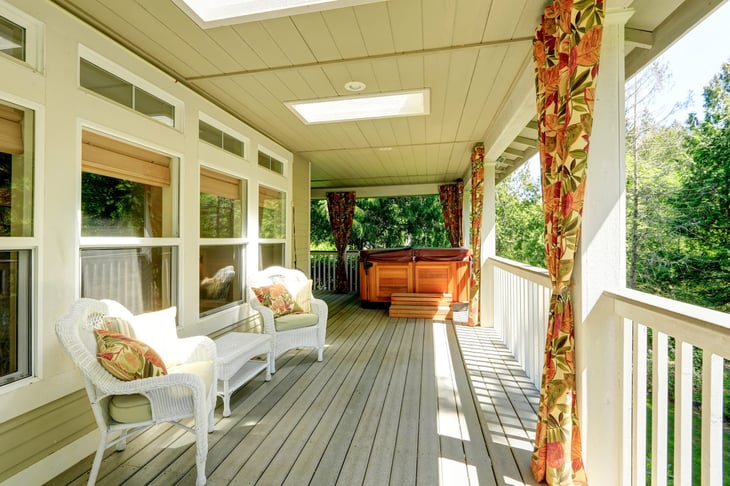 Outdoor patio or wraparound porch or wood deck with curtains