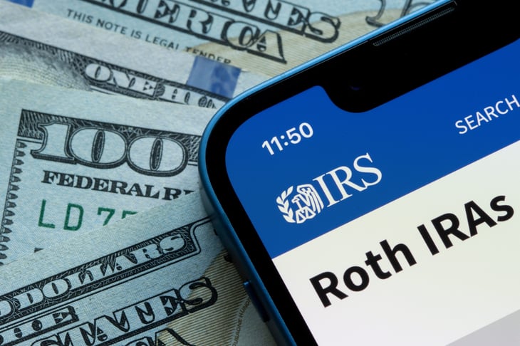The Roth IRAs page on the IRS website is seen on an iPhone.