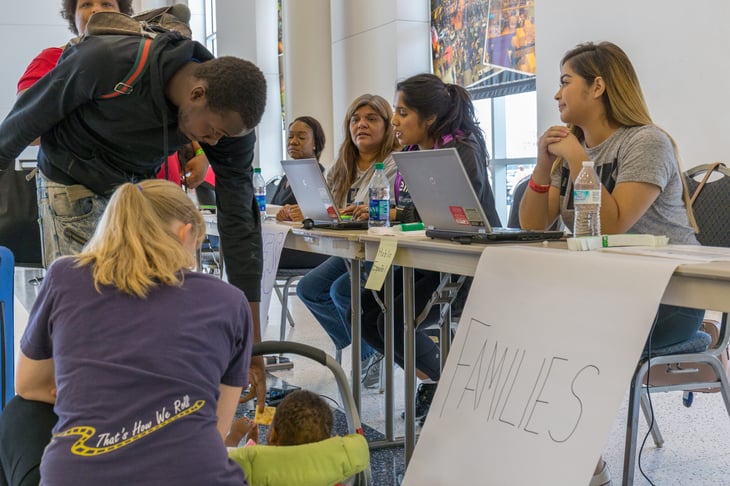 Houston, Texas, August 30, 2017: A hurricane shelter opens at NRG Center as refugees seek safety.Trained support workers check in new flood evacuees
