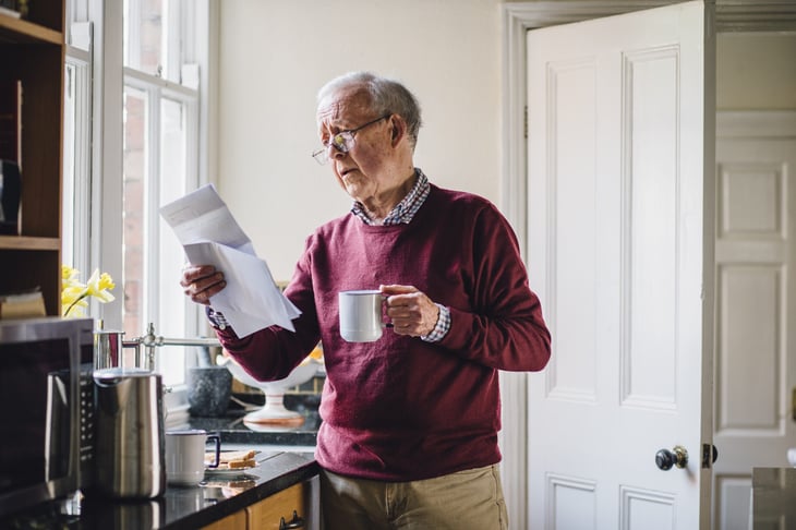 senior man receiving unhappy news