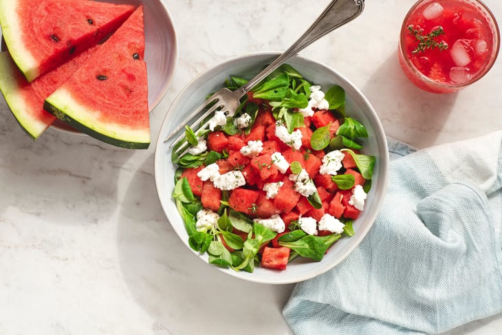 Watermelon salad served with a watermelon drink.