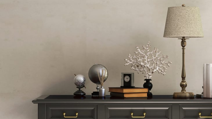 brass lamp and other home decor items