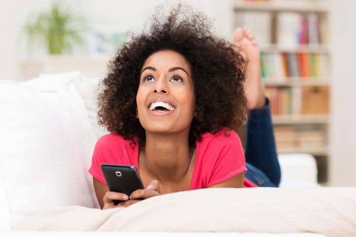 Relaxed woman on her cellphone
