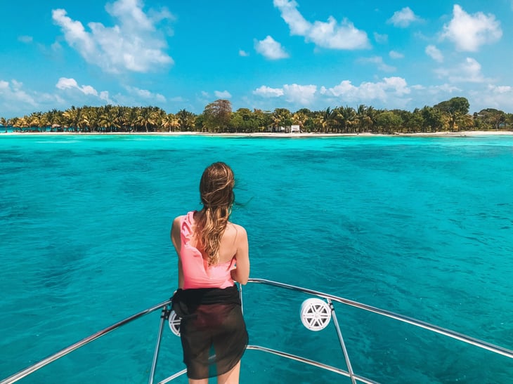Woman looking at island in Belize
