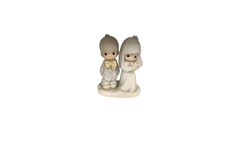 Precious Moments porcelain figurine of a bride and groom