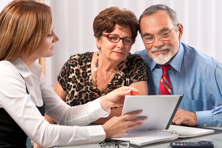 Older couple with their financial advisor
