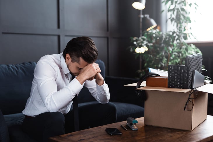 Sad worker who just got fired.