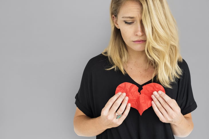 Woman with a broken or injured heart