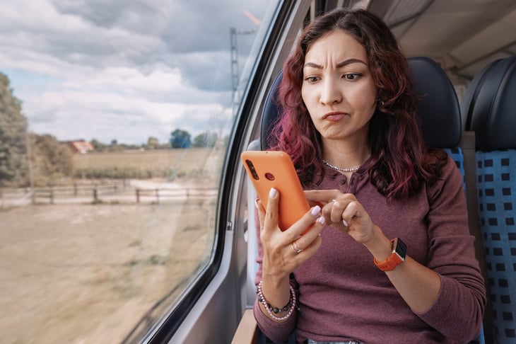 Frustrated woman who can't get cellphone service
