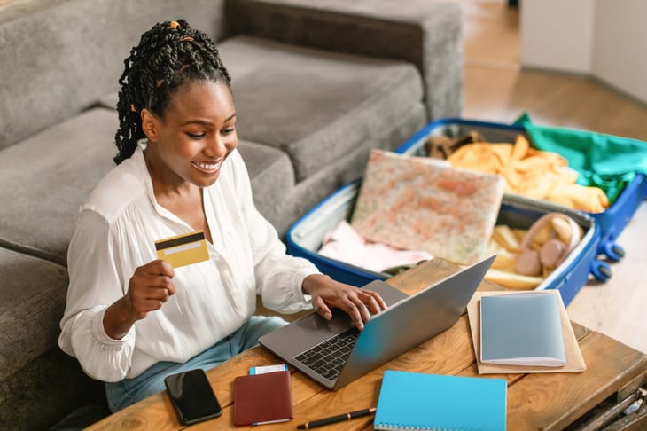Woman booking a flight online