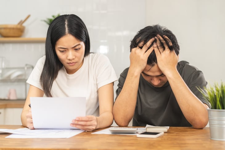 Young couple worried about money