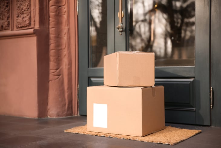 Packages at someone's front door.