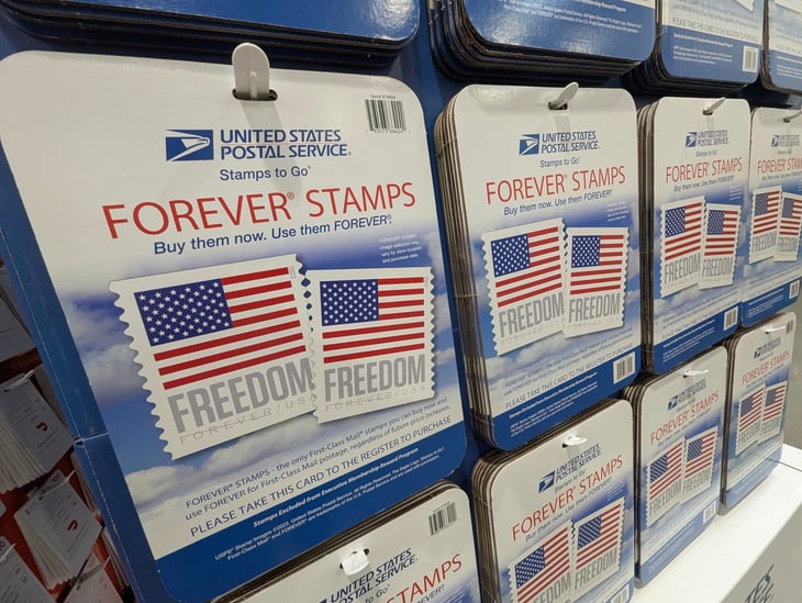 Forever Stamps Booklet Displayed at a Costco Checkout Counter