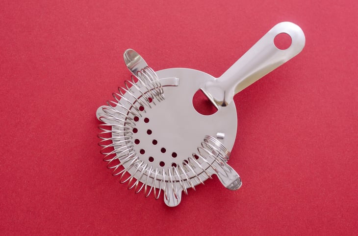 A hawthorne drink strainer.