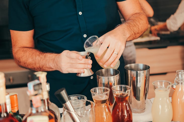 Man making drinks at home.
