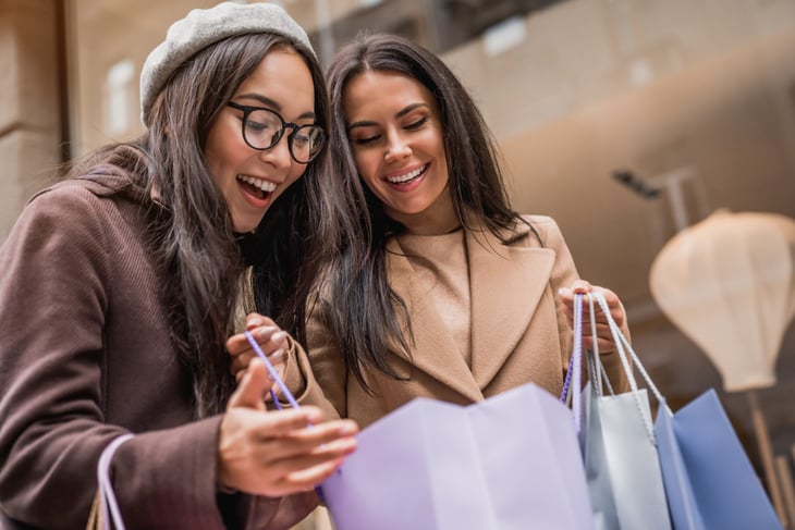 Two women shopping for the holidays