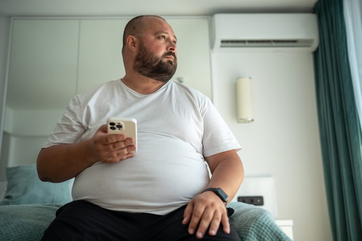 Middle-aged man with belly fat