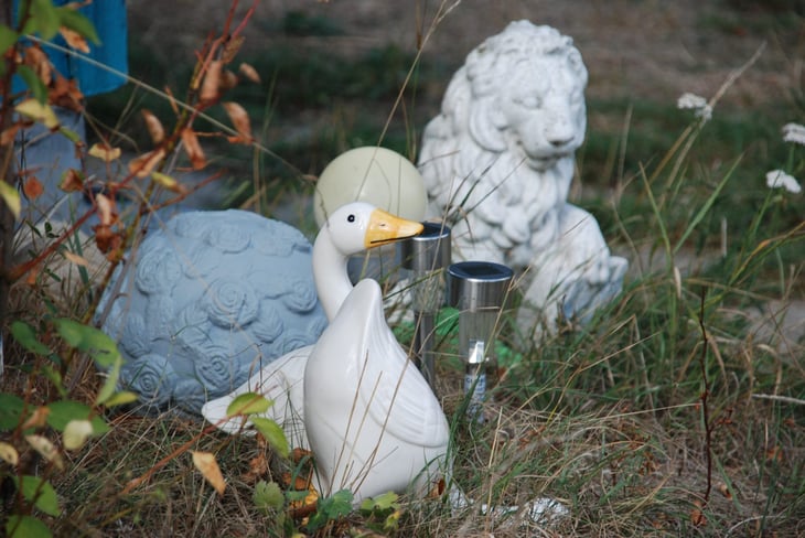 Duck and lion yard decorations.