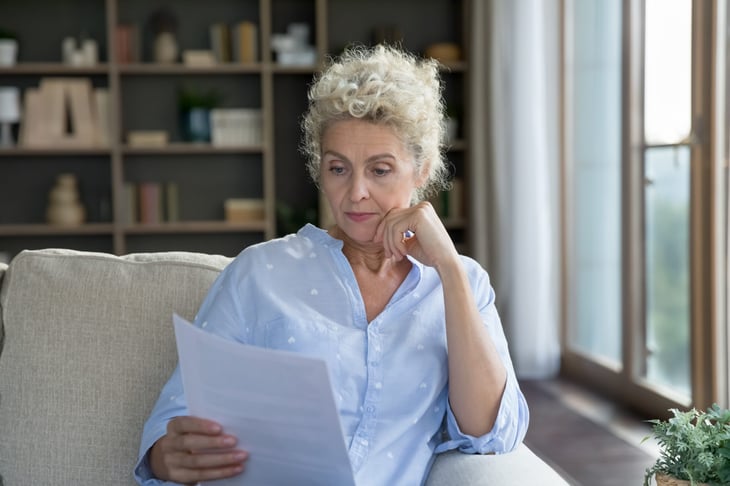 Senior woman looking at a document