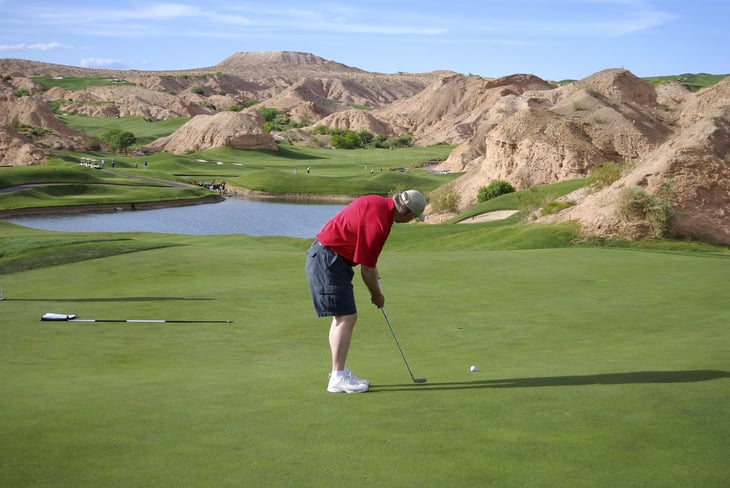 Man putting on golf course in Mesquite, Nevada