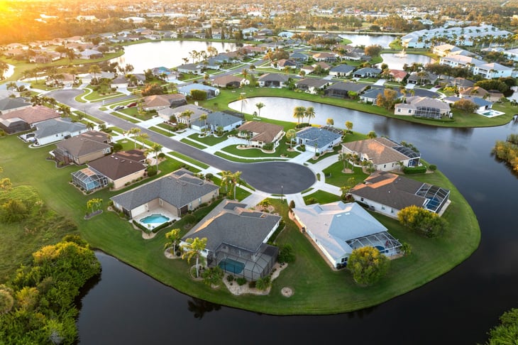 Private residential houses in rural suburban area in North Port, Florida.
