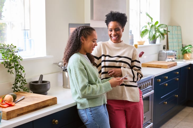 Mother Talking With Teenage Daughter At Home