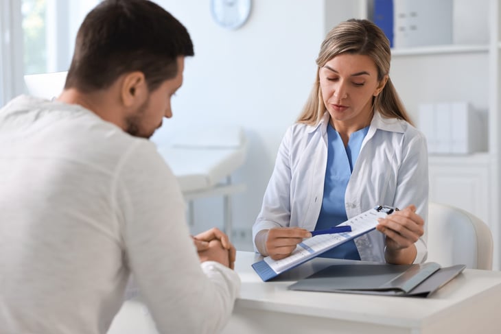 Female doctor with patient