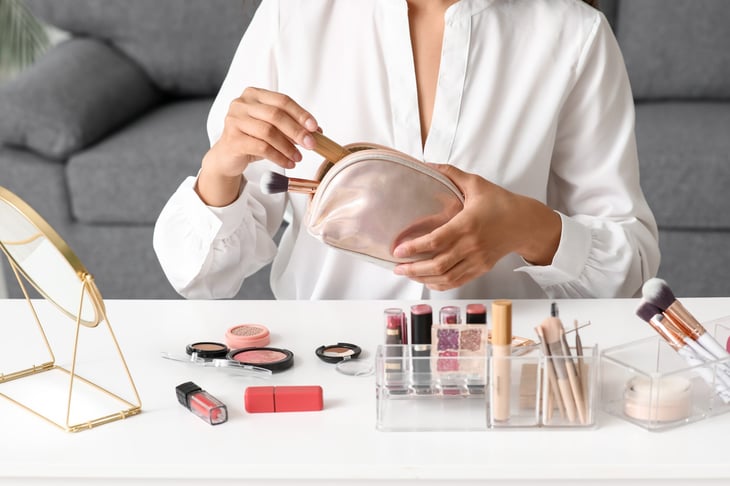 Woman getting ready and doing her makeup