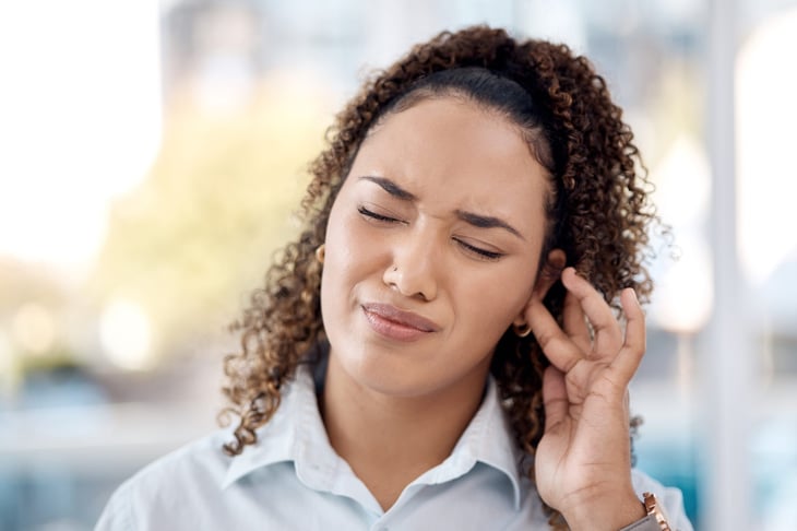 Young woman with hearing issues