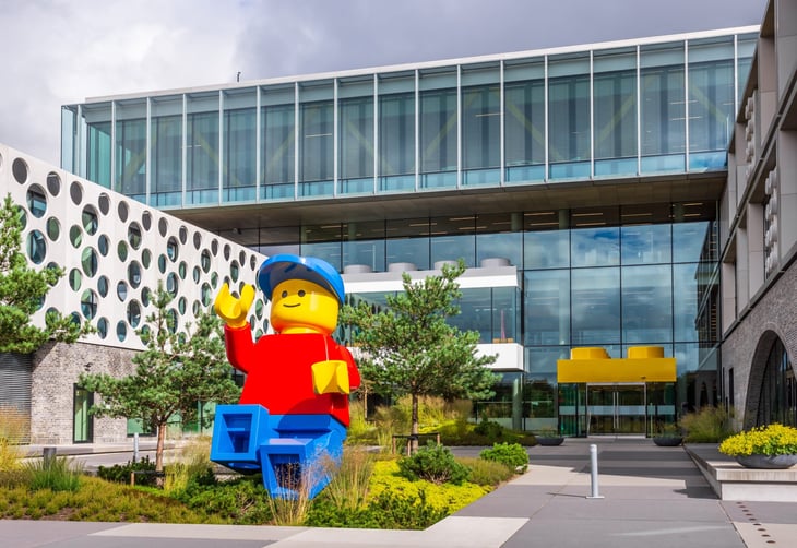 A giant Lego minifigure is set in front of the entrance of the Lego Campus, headquarters of the Lego Group, a Danish construction toy production company.