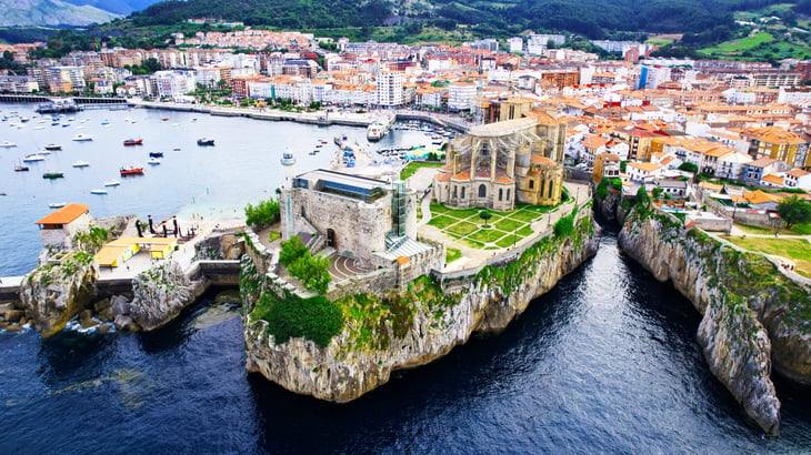 Castro Urdiales port, cliff, and buildings in Cantabria, Spain