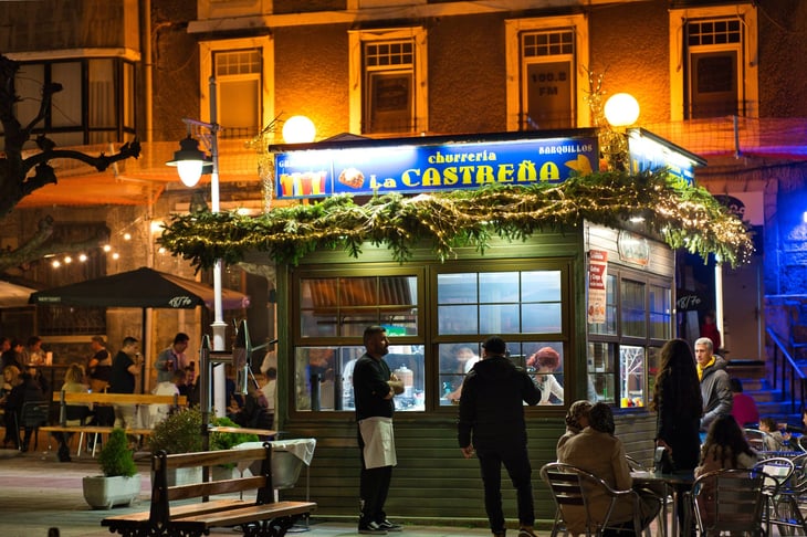 Castro Urdiales, Cantabria, Spain - November 30, 2024: churreria with terrace and customers