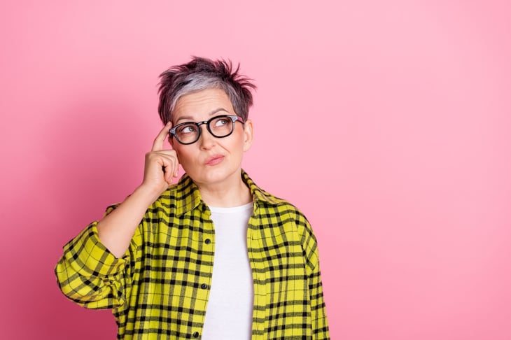 Older woman thinking about things.