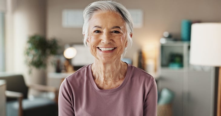 Older woman at home smiling