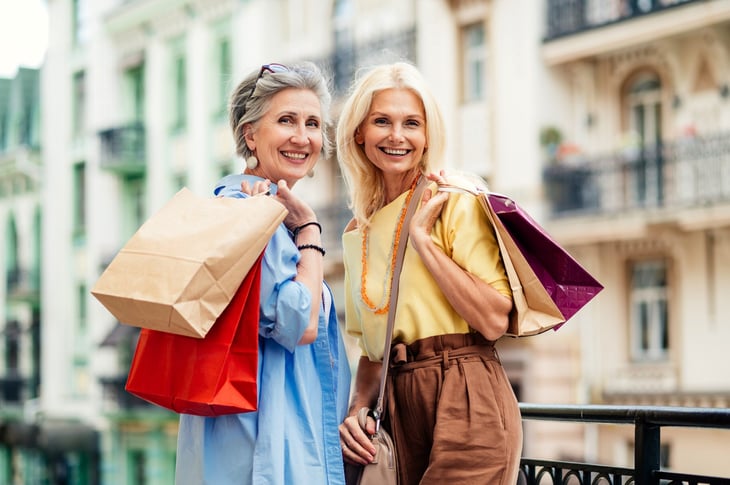 Happy older women shopping