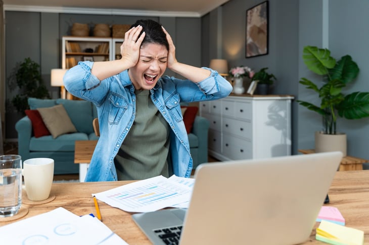 Woman stressed out by taxes