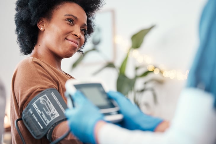 Woman getting a blood pressure reading