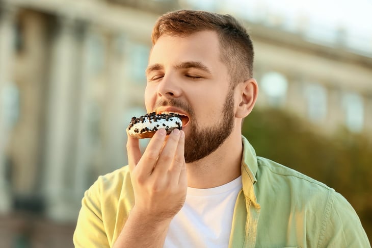 Man eating a doughnut
