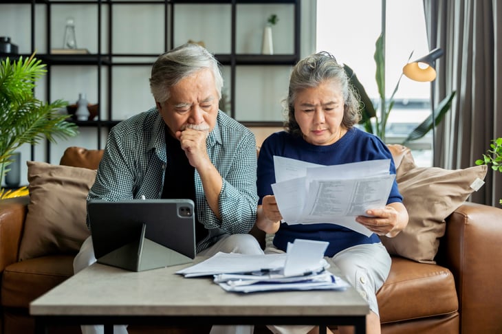 Senior couple organizing their finances together