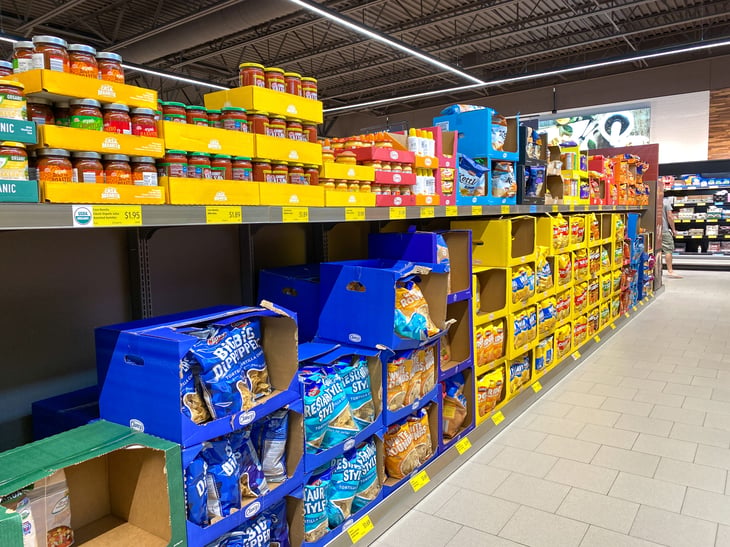 A display of a variety of potato chips and cookies at an Aldi grocery store in Orlando, Florida.