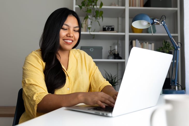 Woman on her computer surfing the internet